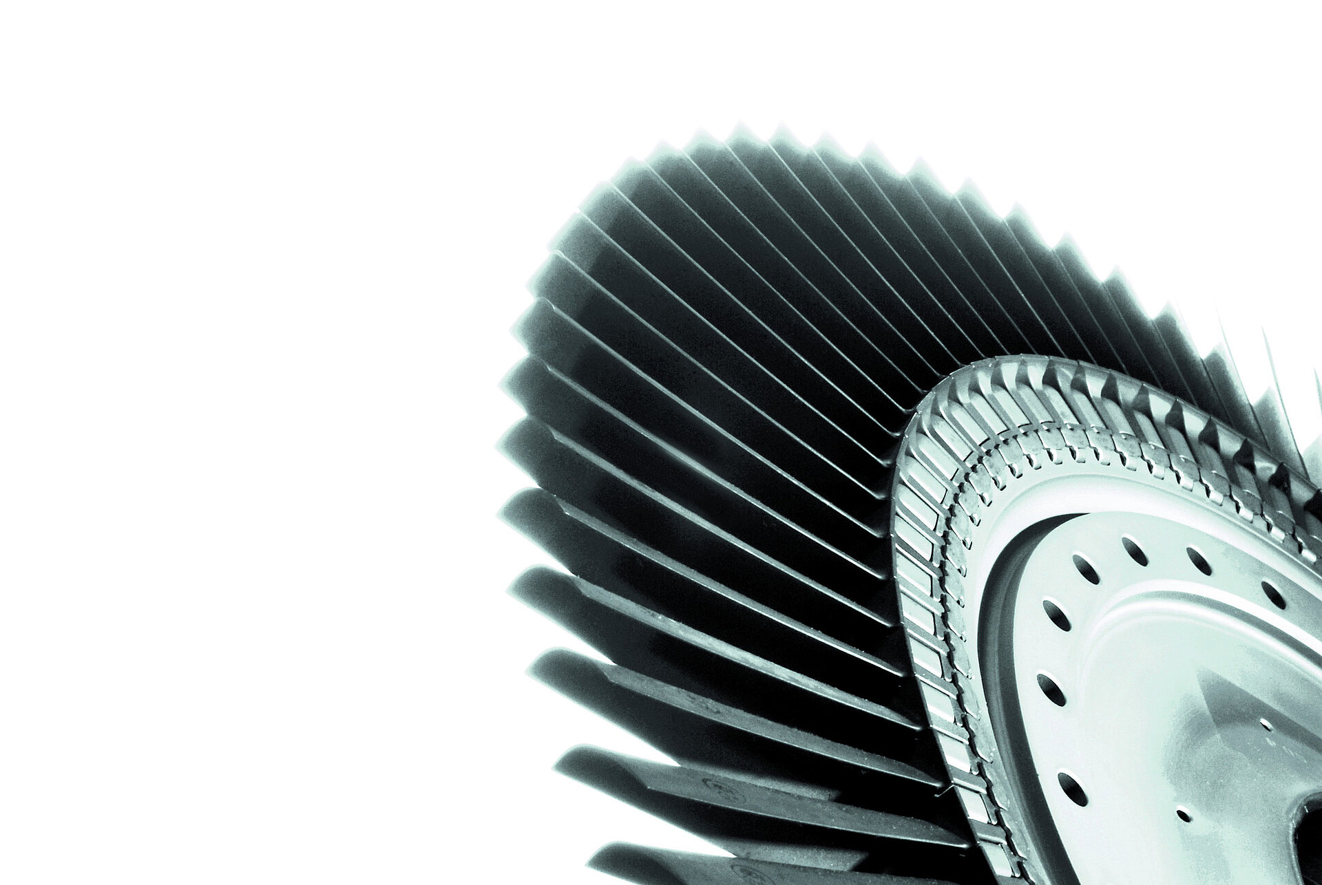 Gas turbine wheel in front of white background