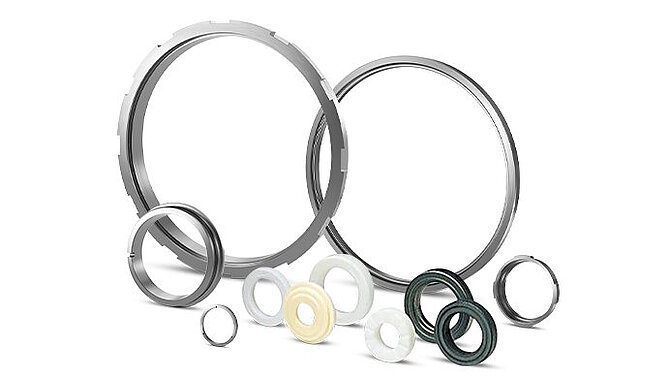 Sealing components for industrial pumps on white background